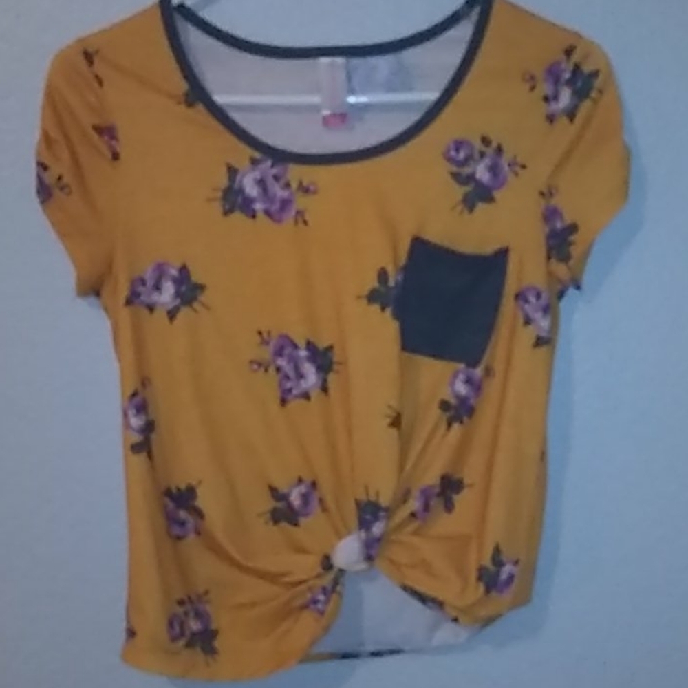 Orange shirt with purple and yellow flowers